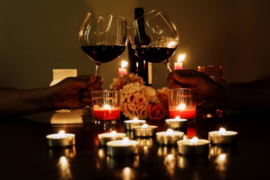 couple toasting with red wine candlelight romant 2023 11 27 05 01 34 utc 1024x683 1