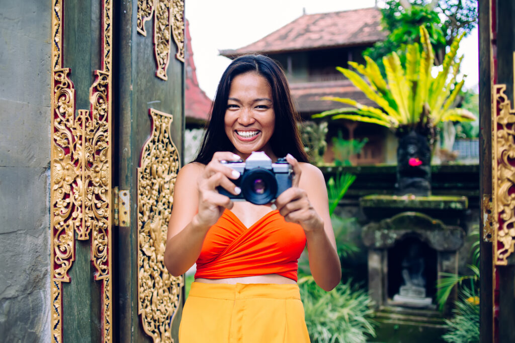 happy young asian female photographing on camera i 2023 12 21 17 15 47 utc 1024x683 1