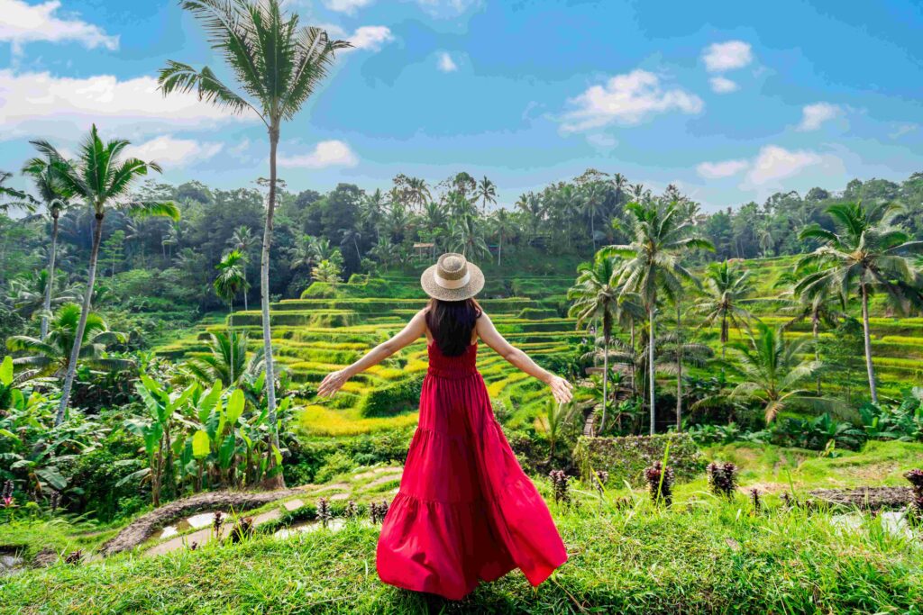 young female tourist in red dress looking at the b 2023 11 27 05 26 20 utc 1024x683 1